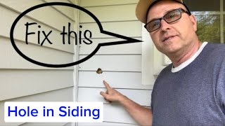 How to Fix a Hole in Siding [upl. by Upshaw753]