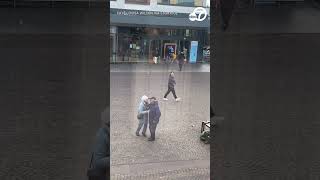 Elderly couple dances to street music in Manchester [upl. by Arnie]