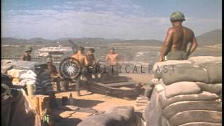 US soldiers of 82nd Artillery fire 105 mm howitzers at North Vietnamese Army posiHD Stock Footage [upl. by Ailis]