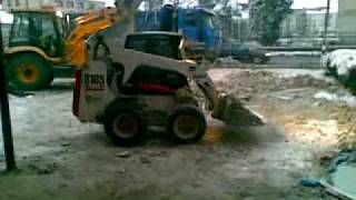 JCB 3CX backhoe loader and bobcat skid steer S 185 at work [upl. by Chapnick]