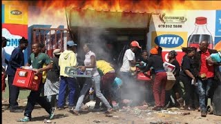 Bloemfontein Residents Brutally Burn amp Loot Foreign Spaza Shop [upl. by Yerocaj]