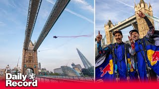 Skydivers achieve Tower Bridge ‘dream’ by completing wingsuit flight through London landmark [upl. by Ainoet]