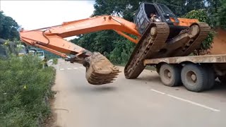 Tata Ex210 Unloading from Trailer Just Missed from Mess 😱😱 tatahitachi tatahitachipoclain mining [upl. by Einaffets225]