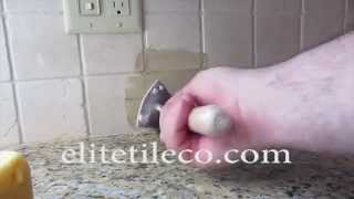 How to replace travertine tiles on a kitchen backsplash [upl. by Alvira164]