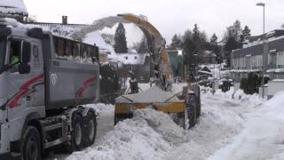 Volvo L70E with snowblower loading truck  Oslo Norway [upl. by Nuavahs]