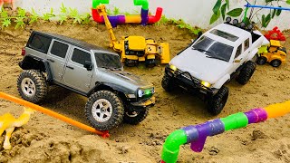 Rc cars jeep wrangler Austar AX8560 Vs Toyota Hilux WPL C641 Comparison test [upl. by Coussoule]