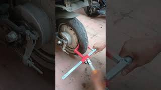 The process of disassembling battery car tires with portable tool [upl. by Ailelc]