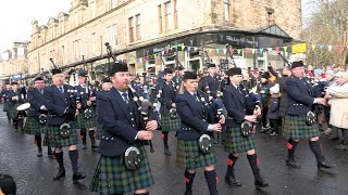 The Vale of Atholl Pipe Band march in starting display for Pitlochry 2024 New Year Street Party [upl. by Hogle]