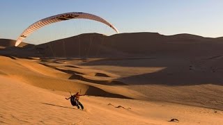 Paragliding Over a Sea of Sand Dunes in Namibia [upl. by Erme]