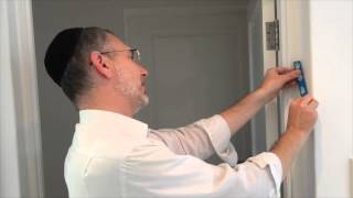 How to put up a mezuzah by Rabbi Kauffman [upl. by Blackburn819]