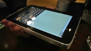 Tactus Technology Shows Us Their New Keyboard Tech CES 2014 [upl. by Tronna952]