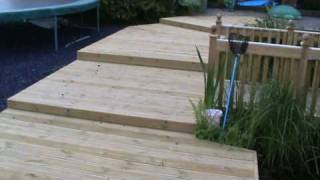 Decking construction around existing pond [upl. by Ygief]