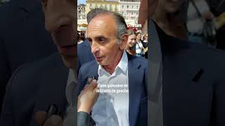 Eric Zemmour frappe une femme qui vient de lui jeter un œuf sur un marché en Corse [upl. by Kecaj]