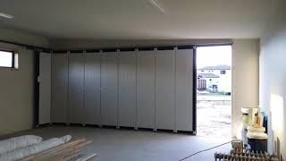 Automatic Sectional Side sliding garage door [upl. by Kciredorb]