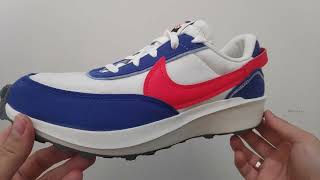 Quick Look  Nike Waffle Debut Swoosh Phantom Habanero Red Old Royal [upl. by Enomis]