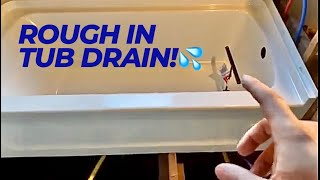 How to rough in pvc drain pipes for a bathtub from the main sewer drain [upl. by Yale]