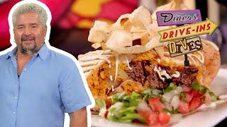 Guy Fieri Eats a Chimi Burrito in Miami FL  Diners DriveIns and Dives  Food Network [upl. by Breeze]