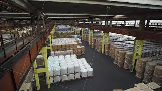 Huge logistics transhipment warehouse from the indoors without people Goods sugar in big bags [upl. by Zak]