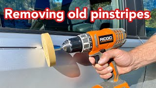 Removing old pinstripes from a car with a decal eraser wheel and razor blade [upl. by Nylssej945]