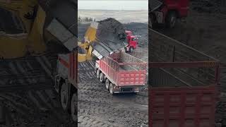 Huge Caterpillar Wheel Loader Loading Trucks With One Pass [upl. by Holzman345]