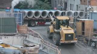 Cat 966H Wheel Loader Unloading Concrete Pipe [upl. by Atiuqehc]