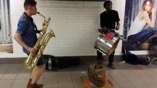 TOO MANY ZOOZ Baritone Saxophone and Drummer Duo Street Performance in NYC Union Square Subway [upl. by Inalem]