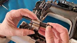 How to repair sewing machine jammed feed dogs  demo on Janome JD1818 [upl. by Tullius779]