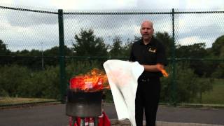 How to use a Fire Blanket  1st Attendance Ltd [upl. by Airasor402]