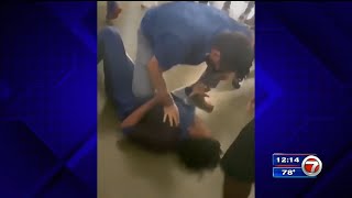 Teacher body slams student while breaking up fight at South Dade Senior High School [upl. by Ocihc]