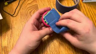 How to easily remove the faceplate of the Tamagotchi Uni Masking tape trick [upl. by Uuge]