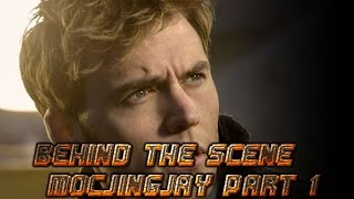 New Mockingjay Part 1 behind the scenes clip  Finnick Sam Clafin [upl. by Ellenid]