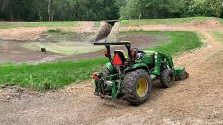 Dredging a farm pond with compact tractors Part 2 [upl. by Christopher]