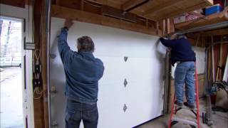 How to install a garage door [upl. by Arihsa]