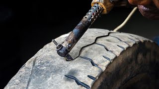 Tire Retreading by Hand  Skilled worker retreads tires by hand [upl. by Arymas111]