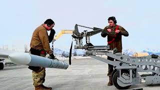 90th Fighter Squadron load Captive Air Training Missiles onto F22 Raptors 2024 [upl. by Nahtnhoj986]