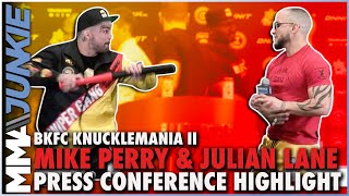 Mike Perry pulls a bat on Julian Lane at BKFC KnuckleMania 2 press conference 😳 [upl. by Rammus764]