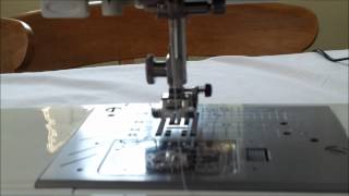 Putting the bobbin in my Janone TXL607 and threading the machine [upl. by Oirogerg449]