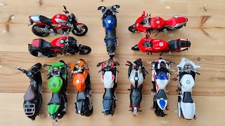 Showing Diecast Motorcycles on the floor Yamaha YZFR1 Ducati Bikes Kawasaki KTM RC8 etc [upl. by Inaluiak861]