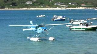 Seaplane arriving at the Flying Boat Club Tresco Isles of Scilly 21st July 2011 [upl. by Sucramraj]