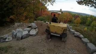 Building a boulder retaining wall [upl. by Sondra660]