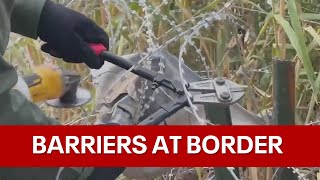 Federal agents cut razor wire Texas installed on USMexico border [upl. by Adnomar]