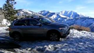 BMW X5 Struggling with a Snow Bank [upl. by Anikahs471]