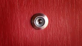 How to install a door viewer peep hole [upl. by Luapsemaj140]