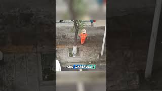 Sanitation worker selflessly collects residents shoes in the rain [upl. by Burbank]