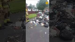 Moment rubbish piles up in the road after bin lorry TIPS OUT waste [upl. by Towroy327]