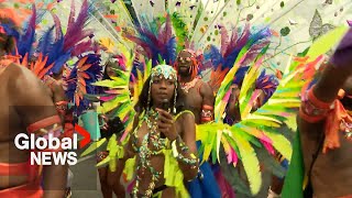 Caribana weekend 2024 Caribbean Carnival parade takes over Toronto [upl. by Llerrit99]