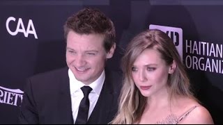 JEREMY RENNER and girlfriend ELIZABETH OLSEN arrive late to Sean Penn benefit concert for Haiti [upl. by Fredrika]