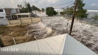 Watch Tsunami Hit Tongas Coast After Underwater Volcano Erupts [upl. by Leanatan319]