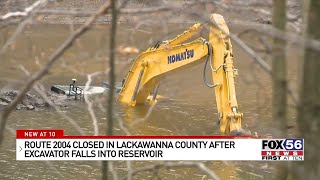 Route 2004 closed in Lackawanna County after excavator falls into reservoir [upl. by Regan]