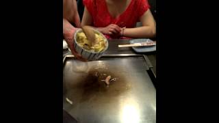 Okonomiyaki Japanese street food how to make Demo in Shinjuku restuarant Tokyo Japan [upl. by Ahsienar]